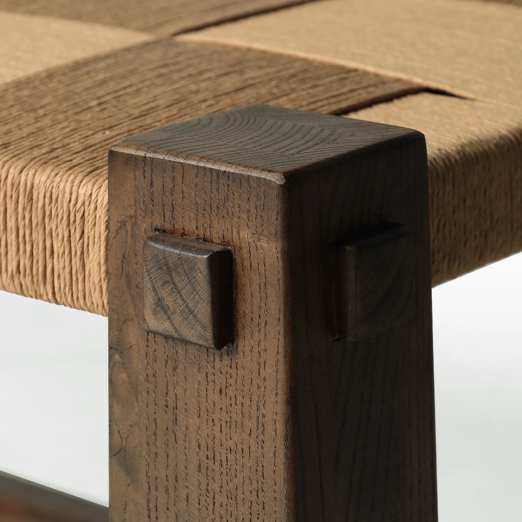 Featuring Malin Natural Paper Cord Accent Bench by Four Hands at Amethyst Home. Thick, block-style legs bookend a two-tier bench for a unique, material-driven take on accent seating. Natural paper cord enwraps the top seat for texture, while a ladder-style lower tier of brown-finished nettlewood brings great color contrast to the whole look.Overall Dimensions: . Amethyst Home provides interior design, new home construction design consulting, vintage area rugs, and lighting in the Omaha metro area.