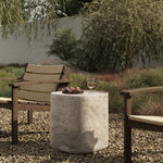 Simple shaping gets an elevated update with a classic plinth base mirrored in a lip detail around the tabletop. The rounded corners of this outdoor end table showcase textured sandy grey concrete, designed to mimic the detail found in natural stone. Cover or store indoors during inclement weather and when not in use. Amethyst Home provides interior design, new home construction design consulting, vintage area rugs, and lighting in the Los Angeles metro area.