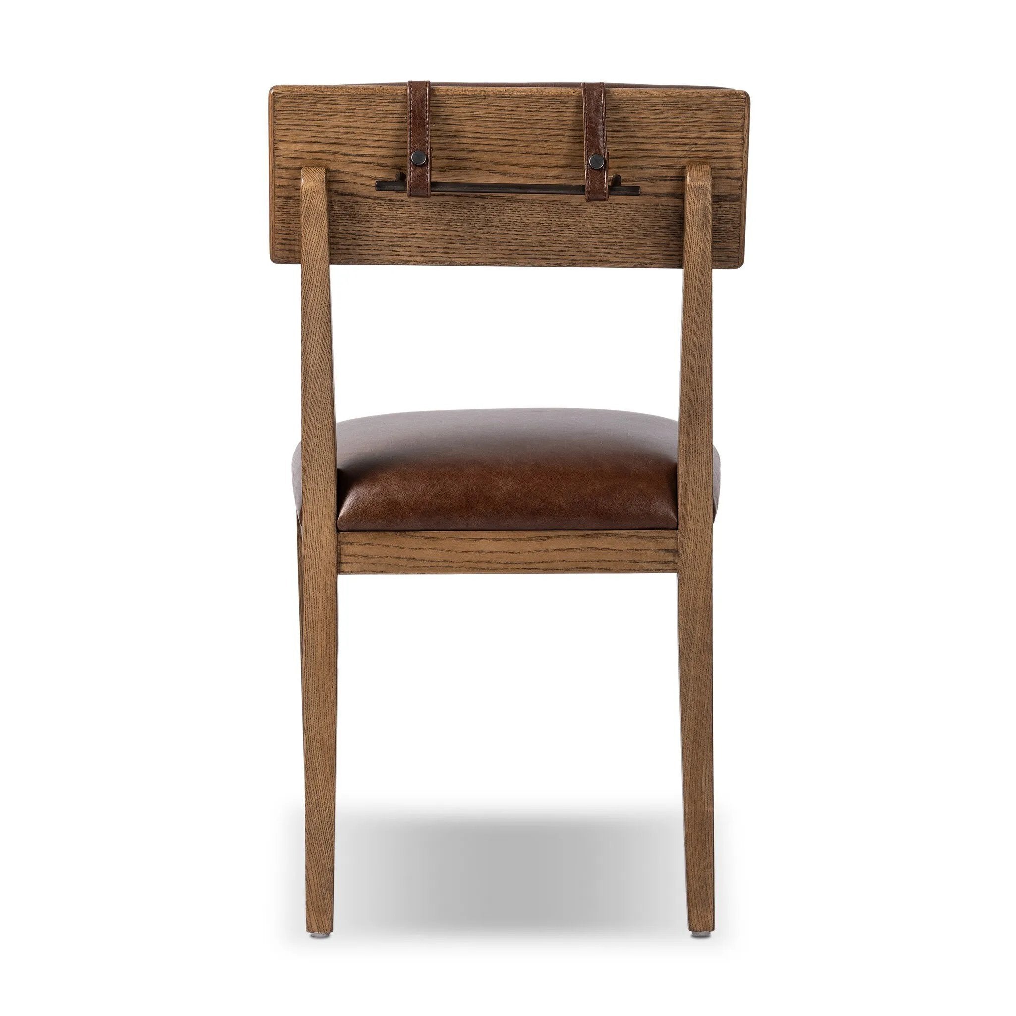 Both modern and traditional, toasted oak frames this high-back, armless dining chair. Finished with a rich brown top-grain leather, with hanging straps affixed to the back Amethyst Home provides interior design, new home construction design consulting, vintage area rugs, and lighting in the Seattle metro area.