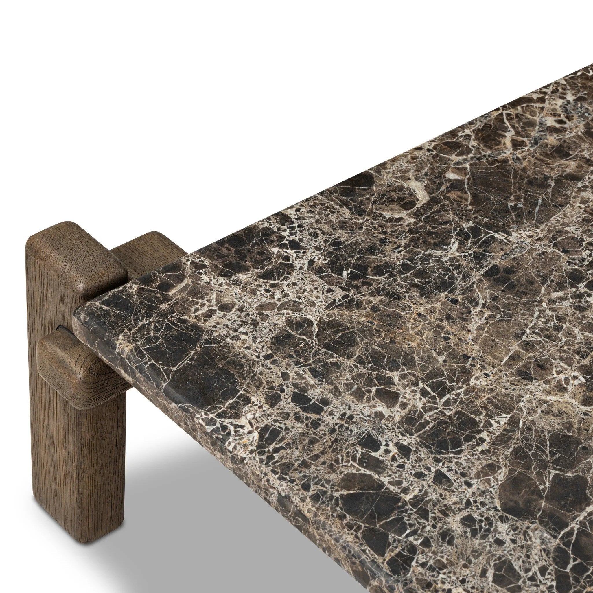 Designed by Thomas Bina and Ronald Sasson, a design partnership blending both modern minimalist and Brazilian influences. Mixed materials elevate the traditional coffee table, pairing solid reclaimed oak and solid marble, with overstated joint details. Rounded edges bring a soft, playful feel to the entire piece. Amethyst Home provides interior design, new home construction design consulting, vintage area rugs, and lighting in the Calabasas metro area.