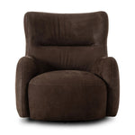 Modern wingback with a twist of barrel back design, this enveloping swivel chair comes with velvety upholstery in a deep brown hue. Deeply cushioned back and seating for maximum comfort, the chair is affixed to a 360-degree swivel base for relaxed lounging Amethyst Home provides interior design, new home construction design consulting, vintage area rugs, and lighting in the Washington metro area.