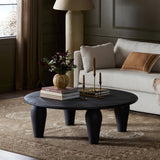 Featuring Maricopa Dark Totem Large Coffee Table by Four Hands at Amethyst Home. Play up proportions. Large, shapely, legs support a rounded tabletop of light black-finished solid reclaimed woods, for a global, organic look and handcrafted feel. Overall Dimensions: 50.00"w x 50.00"d x 16.00"h. Amethyst Home provides interior design, new home construction design consulting, vintage area rugs, and lighting in the Calabasas metro area.