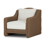 Twisted faux rattan is double twisted for a chunky feel, inspired by traditional coastal designs. The fully woven, cambelback silhouette of this outdoor chair adds visual interest, with high-end, linen-like upholstery bringing subtle contrast to the seat cushions. Amethyst Home provides interior design, new home construction design consulting, vintage area rugs, and lighting in the Calabasas metro area.