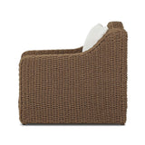 Twisted faux rattan is double twisted for a chunky feel, inspired by traditional coastal designs. The fully woven, cambelback silhouette of this outdoor chair adds visual interest, with high-end, linen-like upholstery bringing subtle contrast to the seat cushions. Amethyst Home provides interior design, new home construction design consulting, vintage area rugs, and lighting in the Dallas metro area.