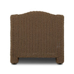 Twisted faux rattan is double twisted for a chunky feel, inspired by traditional coastal designs. The fully woven, cambelback silhouette of this outdoor chair adds visual interest, with high-end, linen-like upholstery bringing subtle contrast to the seat cushions. Amethyst Home provides interior design, new home construction design consulting, vintage area rugs, and lighting in the Houston metro area.