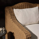 Twisted faux rattan is double twisted for a chunky feel, inspired by traditional coastal designs. The fully woven, cambelback silhouette of this outdoor chair adds visual interest, with high-end, linen-like upholstery bringing subtle contrast to the seat cushions. Amethyst Home provides interior design, new home construction design consulting, vintage area rugs, and lighting in the Tampa metro area.