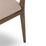 An armless dining style pairs a slim profile and curved back, for a beautifully contoured look. Framed by tan-finished solid oak featuring a center cutout, a seat cushion upholstered in high-performance fabric crafts a comfortable seat perfect for everyday dining. Amethyst Home provides interior design, new home construction design consulting, vintage area rugs, and lighting in the Laguna Beach metro area.