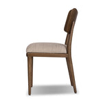 An armless dining style pairs a slim profile and curved back, for a beautifully contoured look. Framed by tan-finished solid oak featuring a center cutout, a seat cushion upholstered in high-performance fabric crafts a comfortable seat perfect for everyday dining. Amethyst Home provides interior design, new home construction design consulting, vintage area rugs, and lighting in the Nashville metro area.