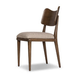 An armless dining style pairs a slim profile and curved back, for a beautifully contoured look. Framed by tan-finished solid oak featuring a center cutout, a seat cushion upholstered in high-performance fabric crafts a comfortable seat perfect for everyday dining. Amethyst Home provides interior design, new home construction design consulting, vintage area rugs, and lighting in the Salt Lake City metro area.
