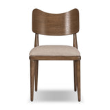 An armless dining style pairs a slim profile and curved back, for a beautifully contoured look. Framed by tan-finished solid oak featuring a center cutout, a seat cushion upholstered in high-performance fabric crafts a comfortable seat perfect for everyday dining. Amethyst Home provides interior design, new home construction design consulting, vintage area rugs, and lighting in the Tampa metro area.