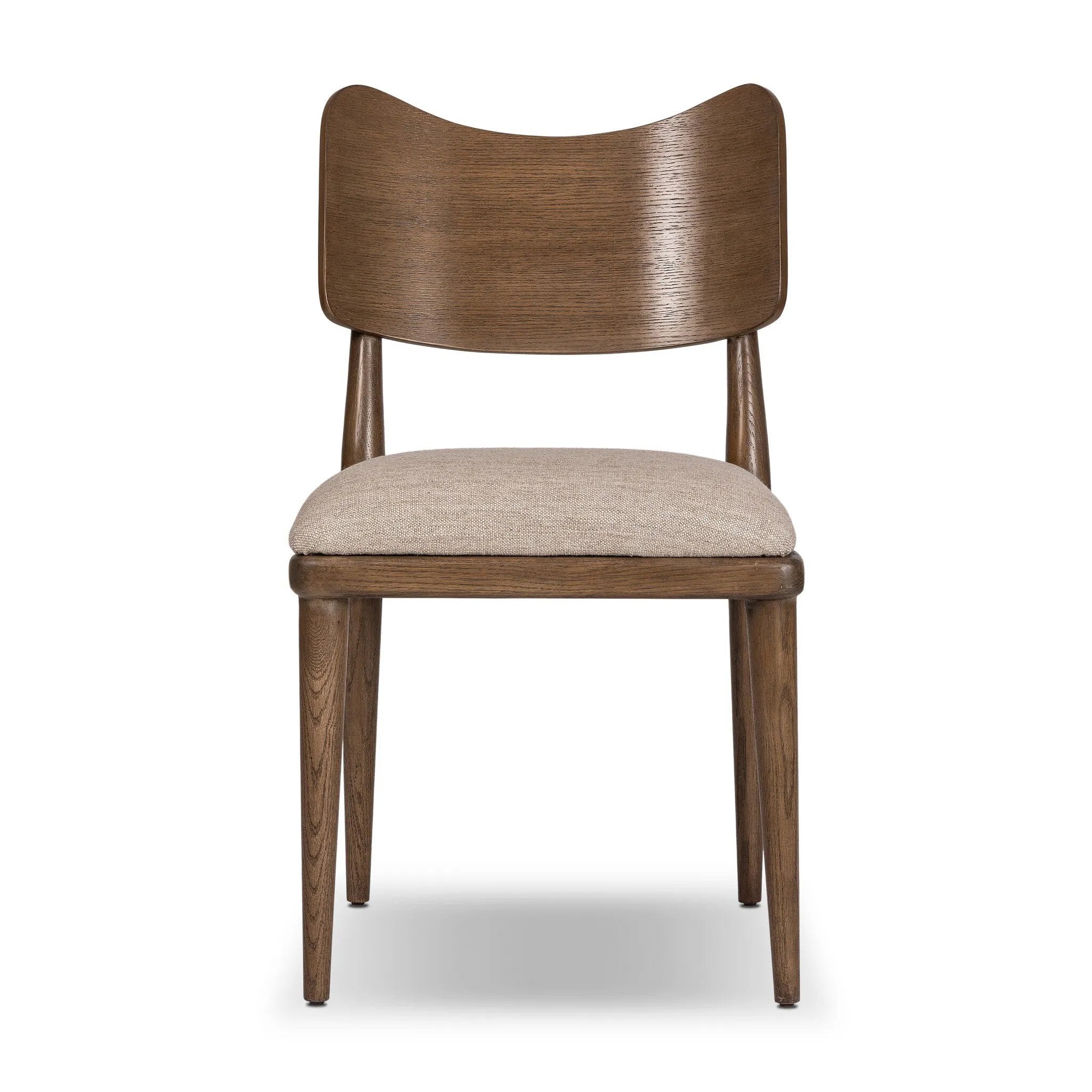 An armless dining style pairs a slim profile and curved back, for a beautifully contoured look. Framed by tan-finished solid oak featuring a center cutout, a seat cushion upholstered in high-performance fabric crafts a comfortable seat perfect for everyday dining. Amethyst Home provides interior design, new home construction design consulting, vintage area rugs, and lighting in the Tampa metro area.