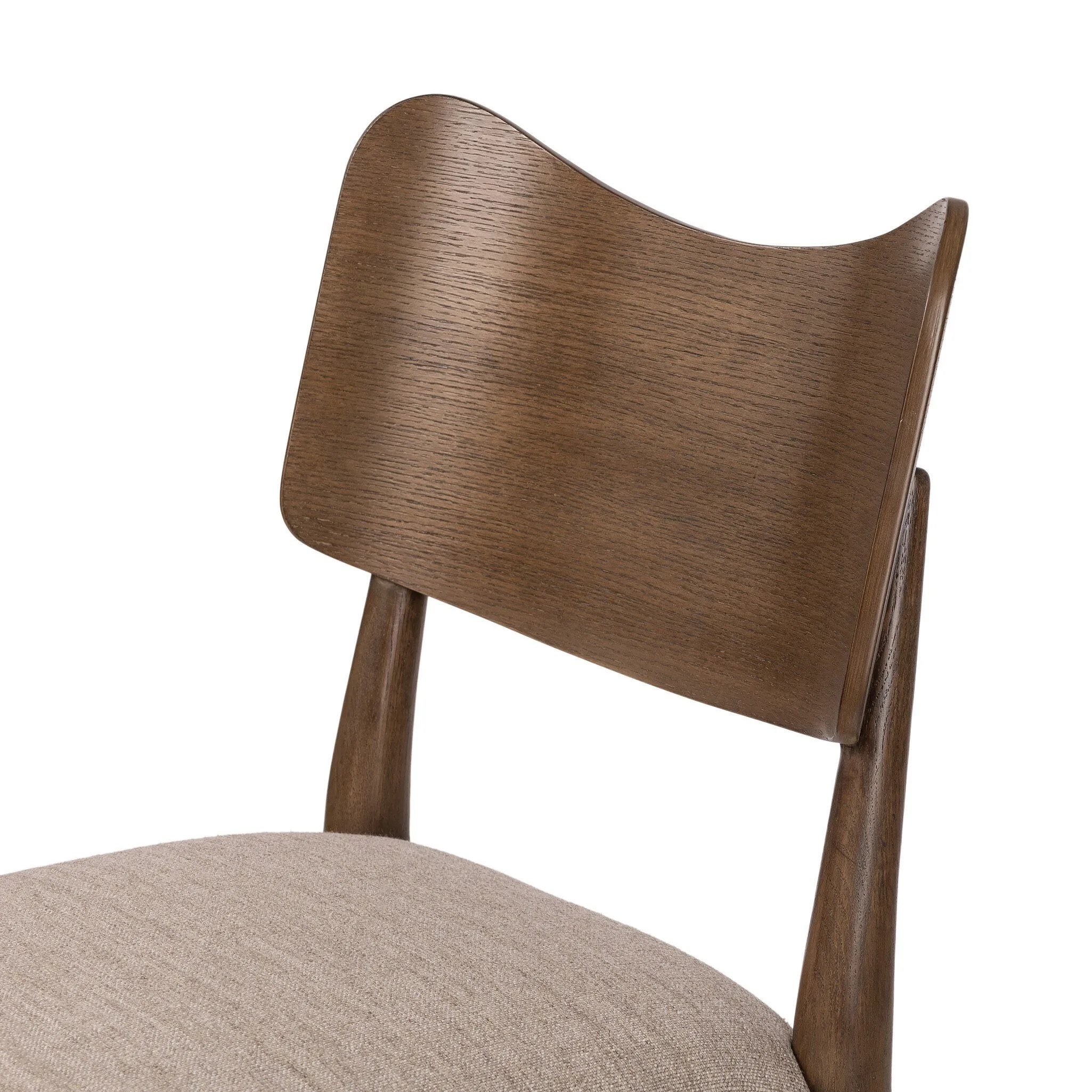 An armless dining style pairs a slim profile and curved back, for a beautifully contoured look. Framed by tan-finished solid oak featuring a center cutout, a seat cushion upholstered in high-performance fabric crafts a comfortable seat perfect for everyday dining. Amethyst Home provides interior design, new home construction design consulting, vintage area rugs, and lighting in the Winter Garden metro area.