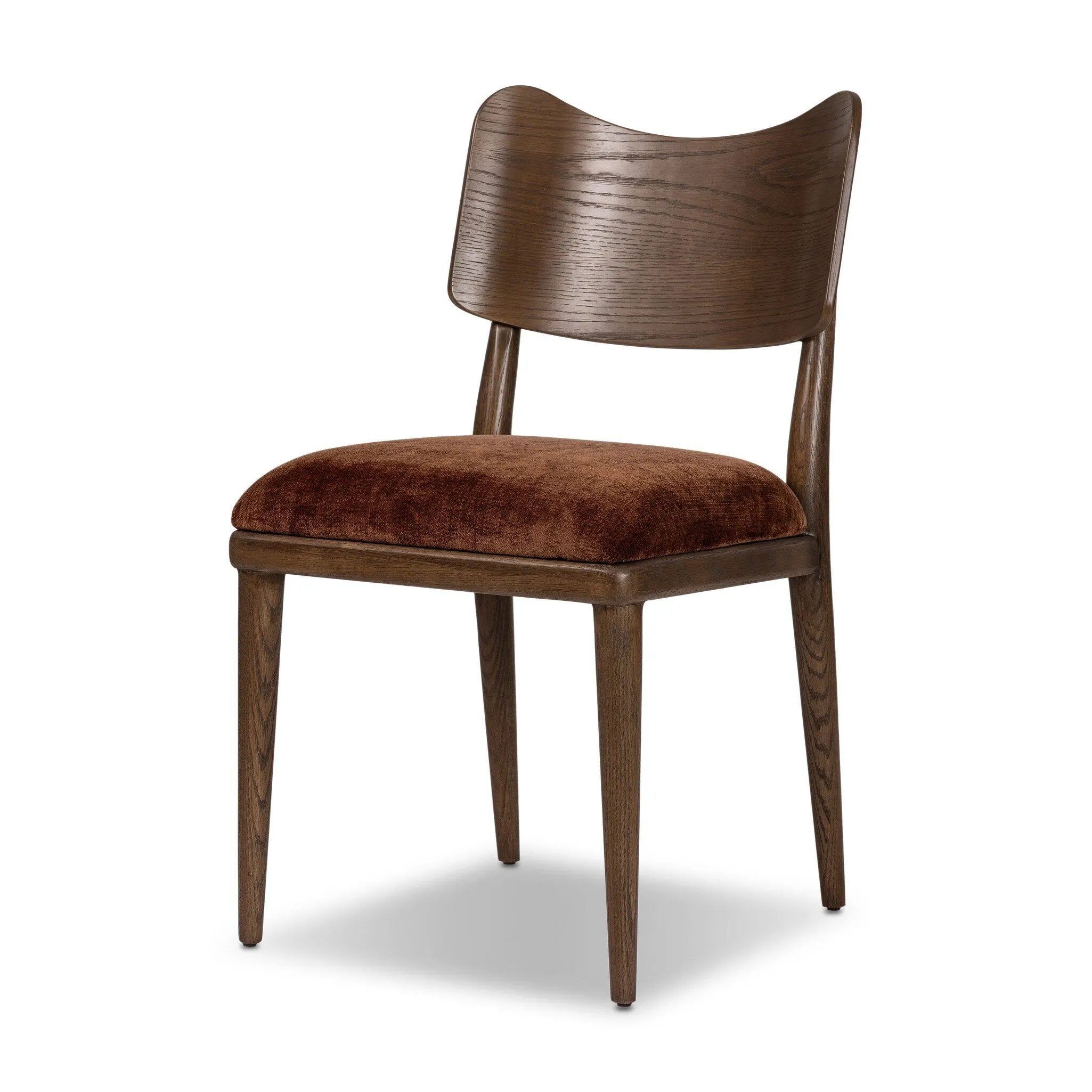 An armless dining style pairs a slim profile and curved back, for a beautifully contoured look. Framed by dark-finished solid oak featuring a center cutout, velvety, rust-colored cushioning crafts a comfortable seat perfect for everyday dining Amethyst Home provides interior design, new home construction design consulting, vintage area rugs, and lighting in the Tampa metro area.