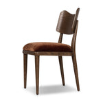 An armless dining style pairs a slim profile and curved back, for a beautifully contoured look. Framed by dark-finished solid oak featuring a center cutout, velvety, rust-colored cushioning crafts a comfortable seat perfect for everyday dining Amethyst Home provides interior design, new home construction design consulting, vintage area rugs, and lighting in the Washington metro area.