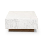 A white Carrara marble slab, rich with veining and movement. Supported by a wooden plinth, marble takes the spotlight in a design that's simple and sophisticated at once.Collection: Hughe Amethyst Home provides interior design, new home construction design consulting, vintage area rugs, and lighting in the Kansas City metro area.