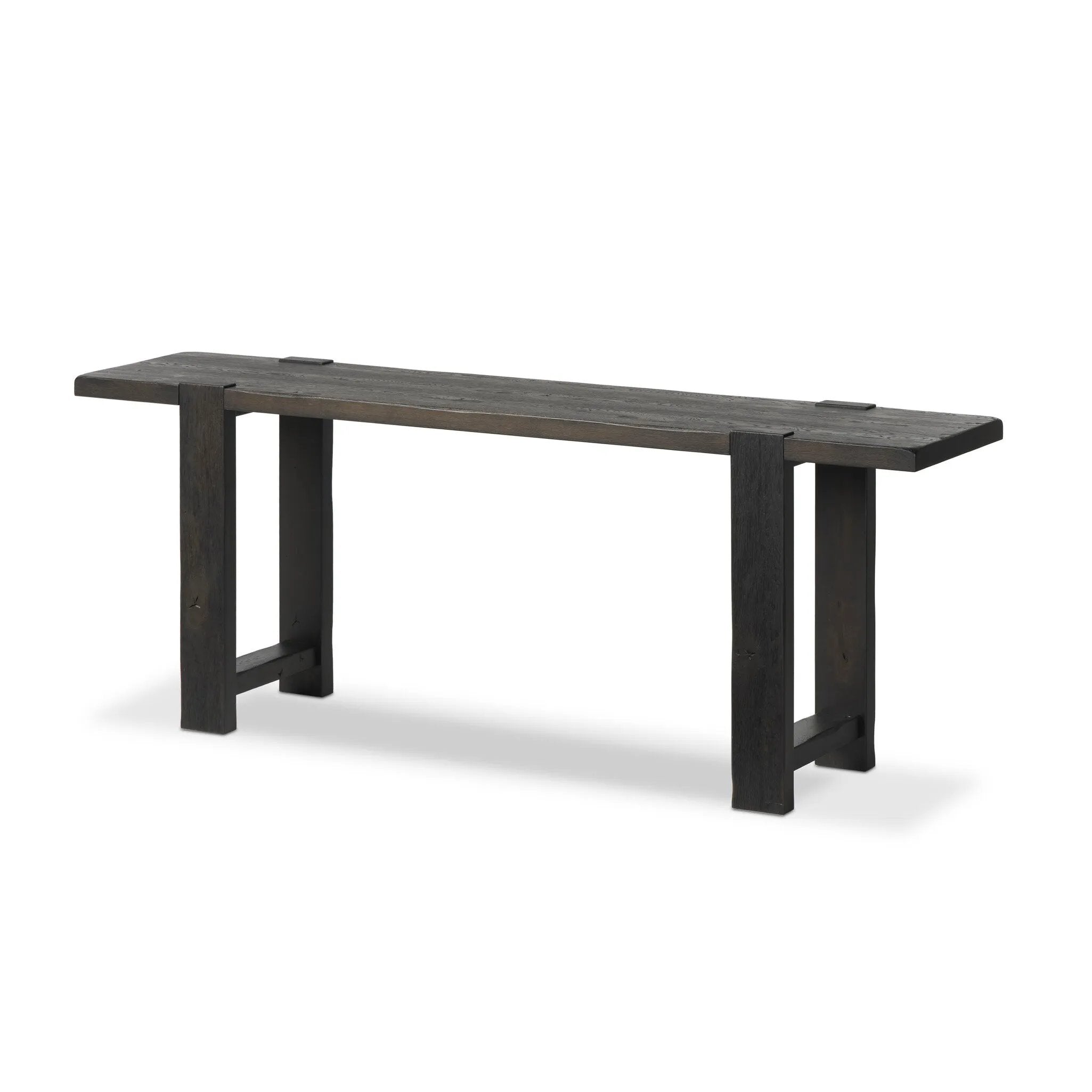 Smoked black oak shapes a simple, open-style console table, with through-tenon joints for an updated farmhouse look.As lovers of luxe style at Amethyst, we love the warm modern inspired Matei Console Table - Smoked Black. This item pairs well with other brands such as Surya and is perfect for minimalist homes Amethyst Home provides interior design, new home construction design consulting, vintage area rugs, and lighting in the Kansas City metro area.