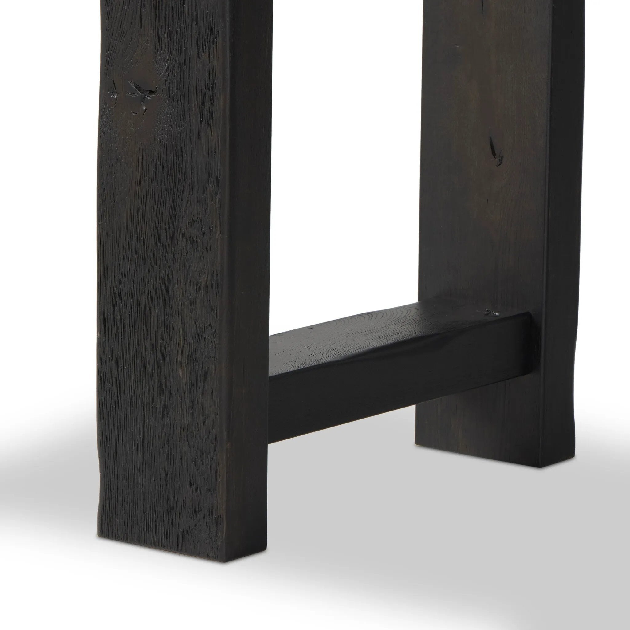 Smoked black oak shapes a simple, open-style console table, with through-tenon joints for an updated farmhouse look.As lovers of luxe style at Amethyst, we love the warm modern inspired Matei Console Table - Smoked Black. This item pairs well with other brands such as Surya and is perfect for minimalist homes Amethyst Home provides interior design, new home construction design consulting, vintage area rugs, and lighting in the Los Angeles metro area.