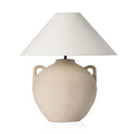 Featuring Mays Light Sand Porcelain Table Lamp by Four Hands at Amethyst Home. Inspired by vintage clay jars, a light sand-colored talavera lamp with handle-like detailing pairs with a tapered linen shade in a versatile ivory. Overall Dimensions: 22.00"w x 22.00"d x 21.00"h
 Shop this lamp at Amethyst - https://www.amethysthome.com/products/mays-light-sand-porc. Amethyst Home provides interior design, new home construction design consulting, vintage area rugs, and lighting in the Miami metro area.