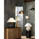 Featuring Mays Light Sand Porcelain Table Lamp by Four Hands at Amethyst Home. Inspired by vintage clay jars, a light sand-colored talavera lamp with handle-like detailing pairs with a tapered linen shade in a versatile ivory. Overall Dimensions: 22.00"w x 22.00"d x 21.00"h
 Shop this lamp at Amethyst - https://www.amethysthome.com/products/mays-light-s. Amethyst Home provides interior design, new home construction design consulting, vintage area rugs, and lighting in the Newport Beach metro area.