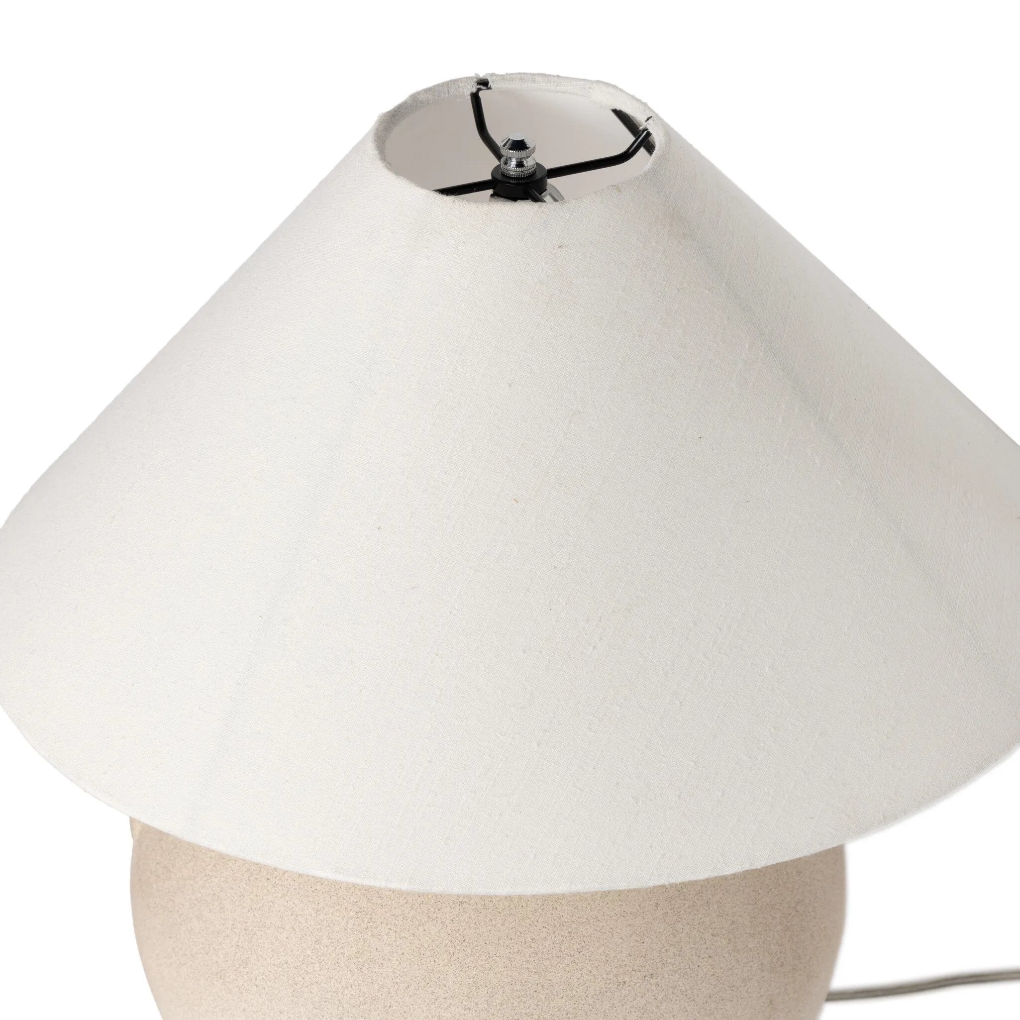 Featuring Mays Light Sand Porcelain Table Lamp by Four Hands at Amethyst Home. Inspired by vintage clay jars, a light sand-colored talavera lamp with handle-like detailing pairs with a tapered linen shade in a versatile ivory. Overall Dimensions: 22.00"w x 22.00"d x 21.00"h
 Shop this lamp at Amethyst - https://www.amethysthome.com/products/mays-light-sand-. Amethyst Home provides interior design, new home construction design consulting, vintage area rugs, and lighting in the San Diego metro area.