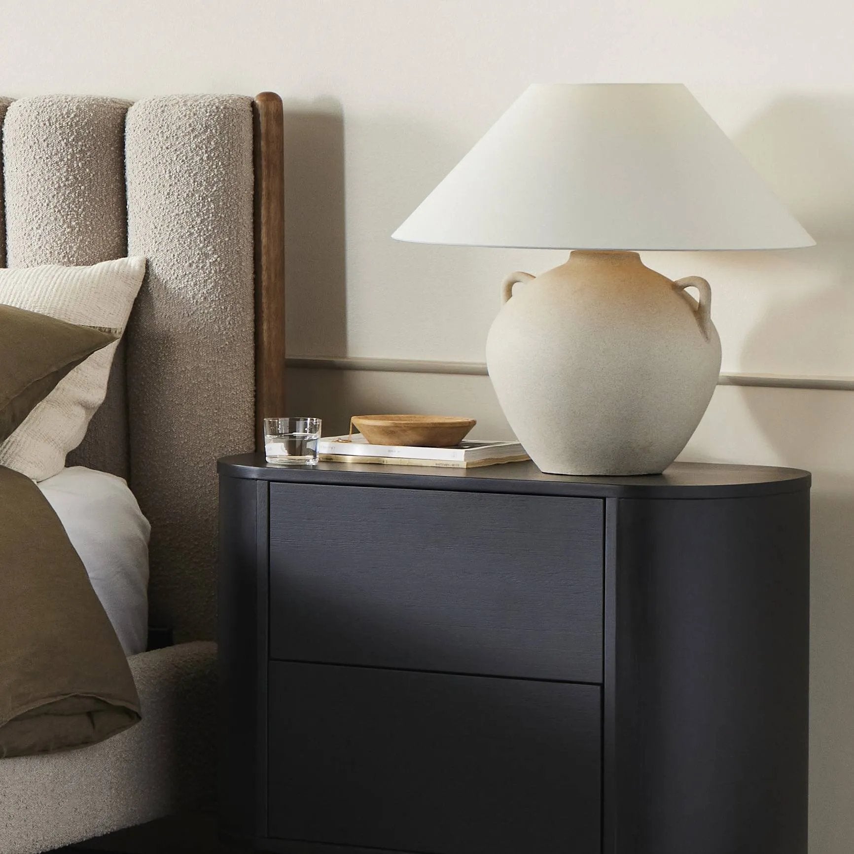 Featuring Mays Light Sand Porcelain Table Lamp by Four Hands at Amethyst Home. Inspired by vintage clay jars, a light sand-colored talavera lamp with handle-like detailing pairs with a tapered linen shade in a versatile ivory. Overall Dimensions: 22.00"w x 22.00"d x 21.00"h
 Shop this lamp at Amethyst - https://www.amethysthome.com/products/mays-light-sand-porc. Amethyst Home provides interior design, new home construction design consulting, vintage area rugs, and lighting in the Tampa metro area.