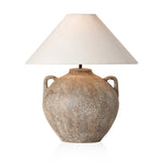 Inspired by vintage clay jars, a brown talavera lamp with handle-like detailing pairs with a tapered linen shade in a versatile ivory Amethyst Home provides interior design, new home construction design consulting, vintage area rugs, and lighting in the Newport Beach metro area.