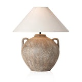 Inspired by vintage clay jars, a brown talavera lamp with handle-like detailing pairs with a tapered linen shade in a versatile ivory Amethyst Home provides interior design, new home construction design consulting, vintage area rugs, and lighting in the Newport Beach metro area.