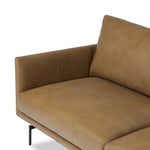 A minimalist sectional to redefine contemporary lounging. Made from tan top-grain leather with a slim profile, expert tailoring and plush cushions for comfort. Sleek metal legs and compact sizing make this piece a versatile anchor for smaller living spaces Amethyst Home provides interior design, new home construction design consulting, vintage area rugs, and lighting in the Alpharetta metro area.