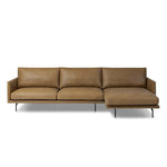 A minimalist sectional to redefine contemporary lounging. Made from tan top-grain leather with a slim profile, expert tailoring and plush cushions for comfort. Sleek metal legs and compact sizing make this piece a versatile anchor for smaller living spaces Amethyst Home provides interior design, new home construction design consulting, vintage area rugs, and lighting in the Des Moines metro area.