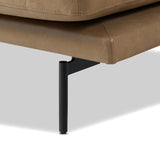 A minimalist sectional to redefine contemporary lounging. Made from tan top-grain leather with a slim profile, expert tailoring and plush cushions for comfort. Sleek metal legs and compact sizing make this piece a versatile anchor for smaller living spaces Amethyst Home provides interior design, new home construction design consulting, vintage area rugs, and lighting in the Houston metro area.