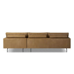 A minimalist sectional to redefine contemporary lounging. Made from tan top-grain leather with a slim profile, expert tailoring and plush cushions for comfort. Sleek metal legs and compact sizing make this piece a versatile anchor for smaller living spaces Amethyst Home provides interior design, new home construction design consulting, vintage area rugs, and lighting in the Laguna Beach metro area.