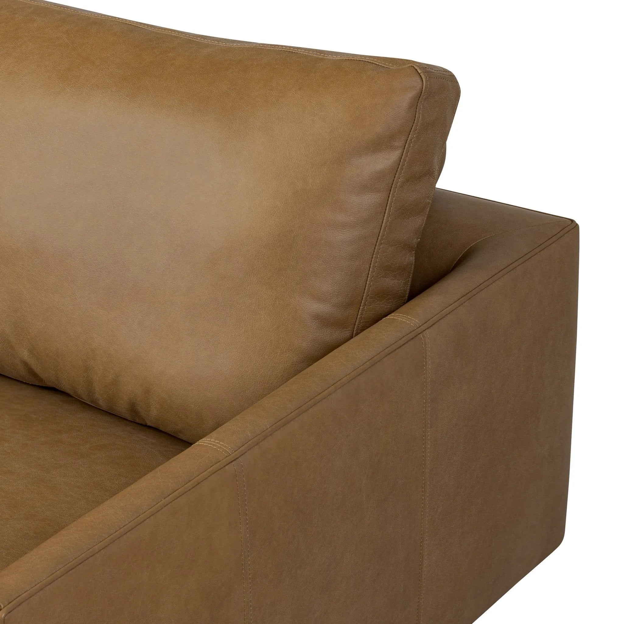 A minimalist sectional to redefine contemporary lounging. Made from tan top-grain leather with a slim profile, expert tailoring and plush cushions for comfort. Sleek metal legs and compact sizing make this piece a versatile anchor for smaller living spaces Amethyst Home provides interior design, new home construction design consulting, vintage area rugs, and lighting in the Miami metro area.