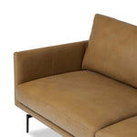 A minimalist sectional to redefine contemporary lounging. Made from tan top-grain leather with a slim profile, expert tailoring and plush cushions for comfort. Sleek metal legs and compact sizing make this piece a versatile anchor for smaller living spaces Amethyst Home provides interior design, new home construction design consulting, vintage area rugs, and lighting in the Monterey metro area.