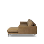 A minimalist sectional to redefine contemporary lounging. Made from tan top-grain leather with a slim profile, expert tailoring and plush cushions for comfort. Sleek metal legs and compact sizing make this piece a versatile anchor for smaller living spaces Amethyst Home provides interior design, new home construction design consulting, vintage area rugs, and lighting in the Newport Beach metro area.
