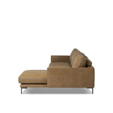 A minimalist sectional to redefine contemporary lounging. Made from tan top-grain leather with a slim profile, expert tailoring and plush cushions for comfort. Sleek metal legs and compact sizing make this piece a versatile anchor for smaller living spaces Amethyst Home provides interior design, new home construction design consulting, vintage area rugs, and lighting in the Newport Beach metro area.