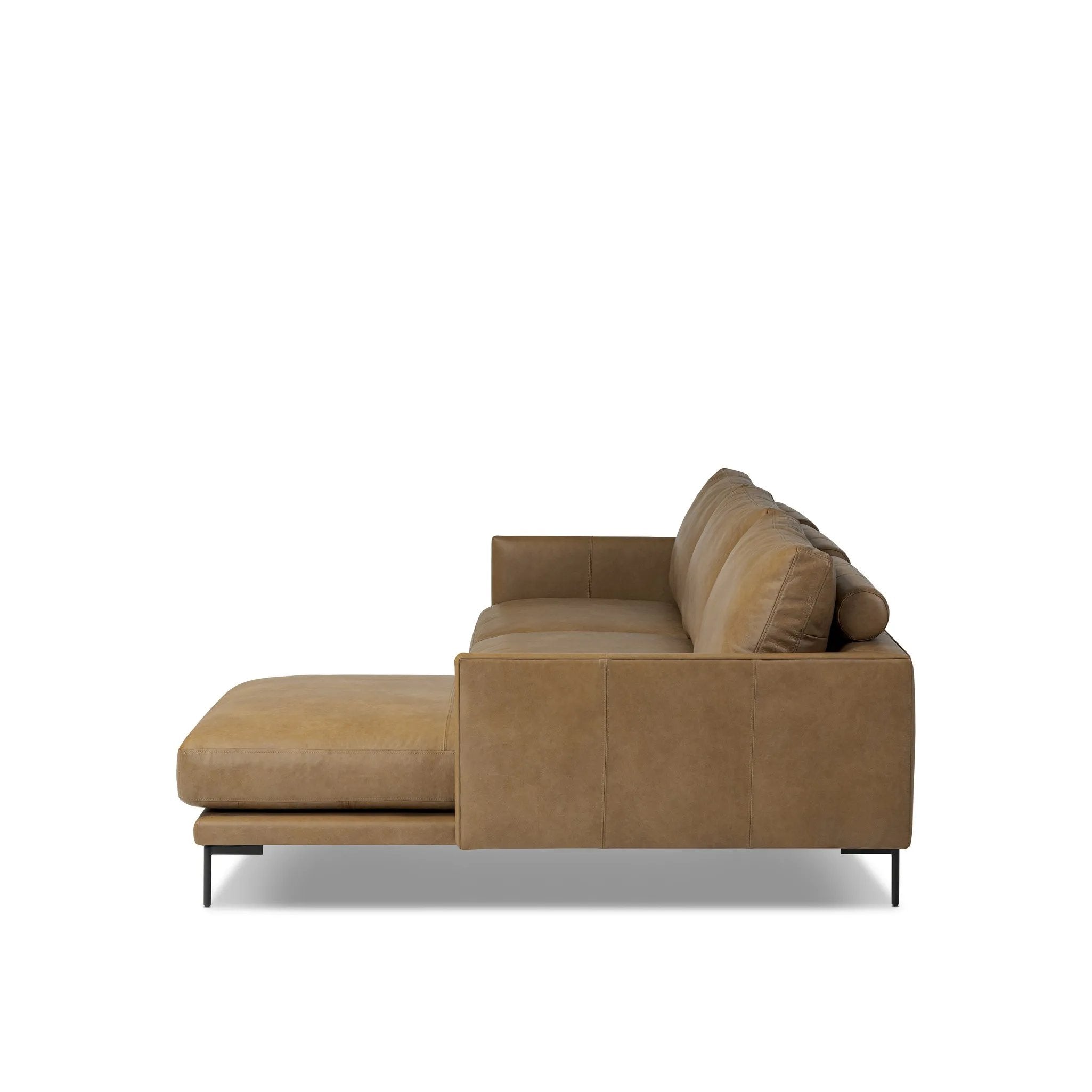 A minimalist sectional to redefine contemporary lounging. Made from tan top-grain leather with a slim profile, expert tailoring and plush cushions for comfort. Sleek metal legs and compact sizing make this piece a versatile anchor for smaller living spaces Amethyst Home provides interior design, new home construction design consulting, vintage area rugs, and lighting in the Newport Beach metro area.