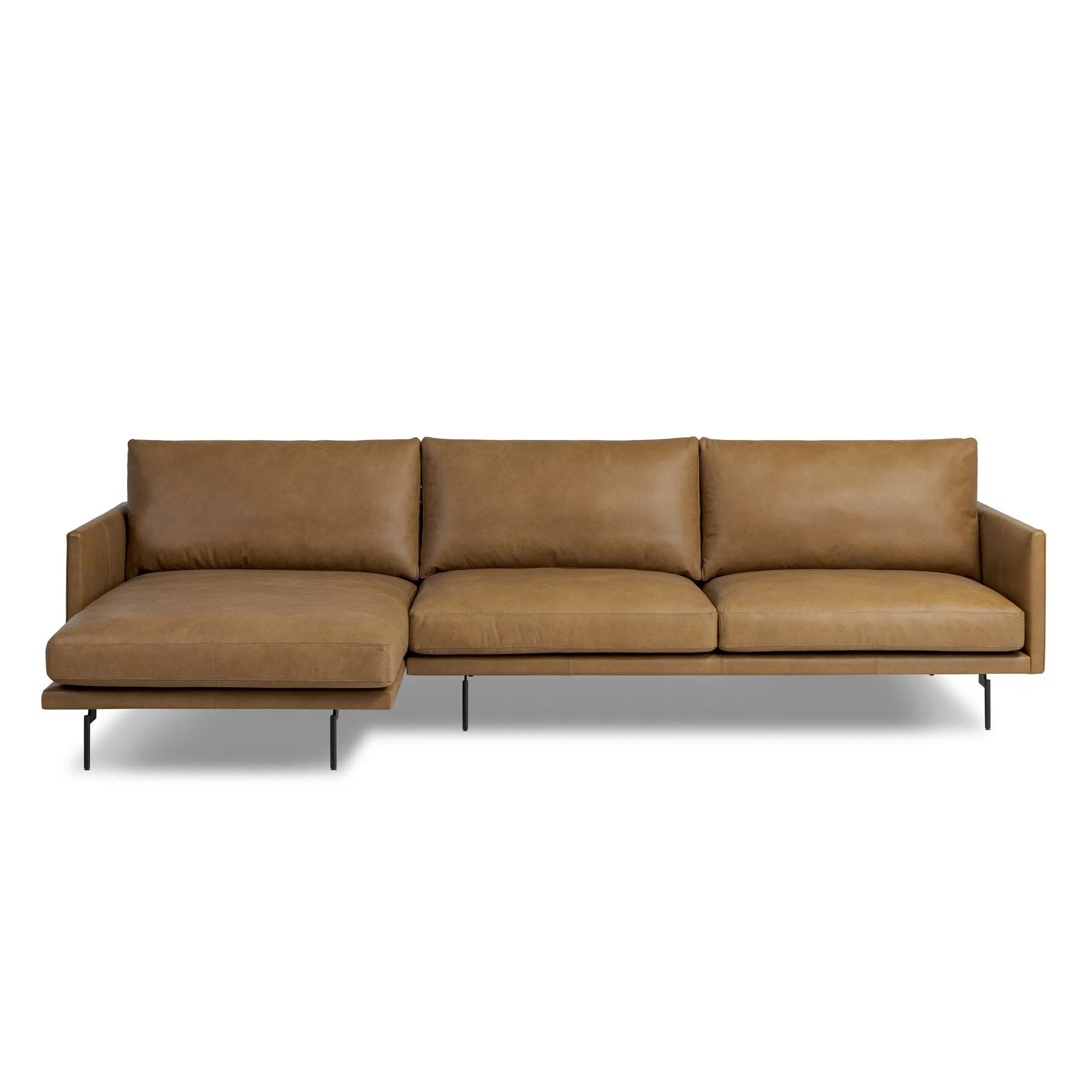 A minimalist sectional to redefine contemporary lounging. Made from tan top-grain leather with a slim profile, expert tailoring and plush cushions for comfort. Sleek metal legs and compact sizing make this piece a versatile anchor for smaller living spaces Amethyst Home provides interior design, new home construction design consulting, vintage area rugs, and lighting in the Portland metro area.