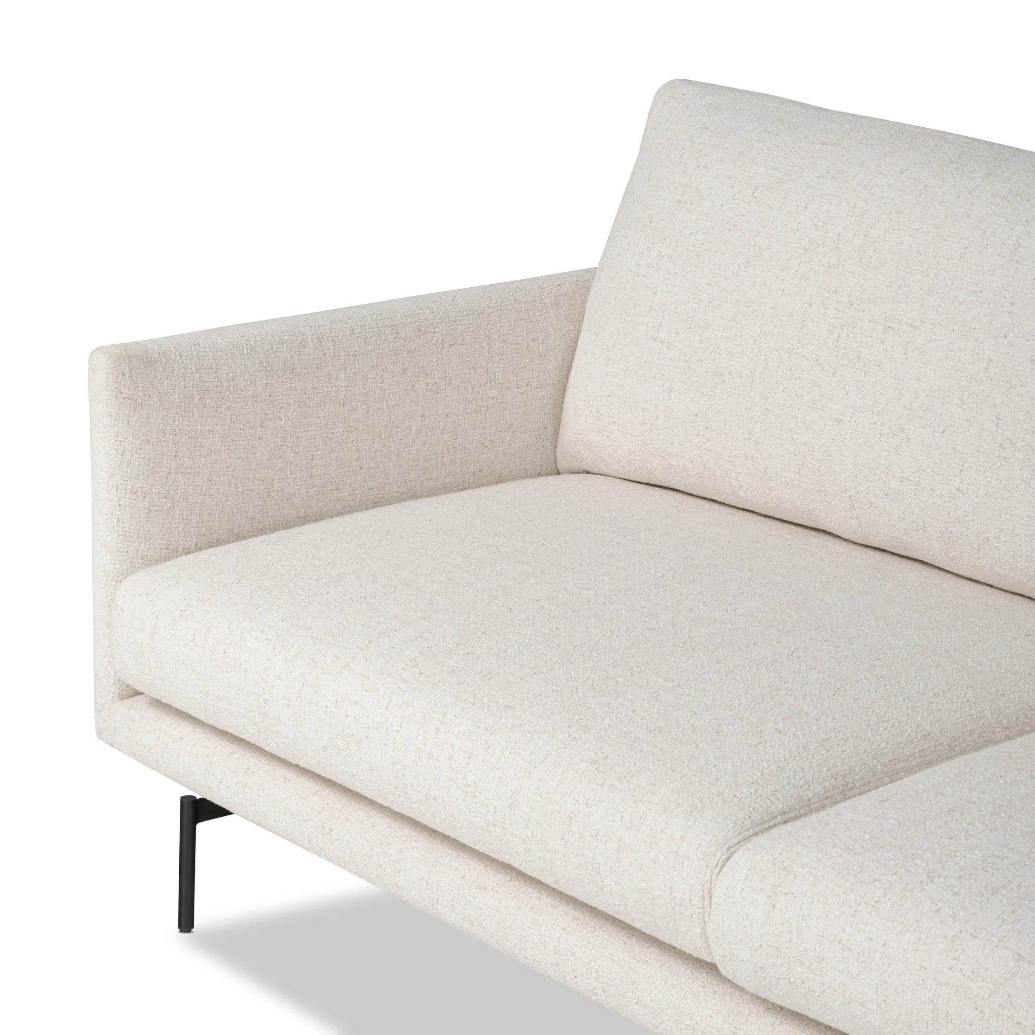 A minimalist form to redefine the contemporary sectional. Made from light, neutral high-performance with a slim profile, expert tailoring and plush cushions for comfort. Sleek metal legs and compact sizing make this piece a versatile anchor for smaller living spaces. Amethyst Home provides interior design, new home construction design consulting, vintage area rugs, and lighting in the Boston metro area.