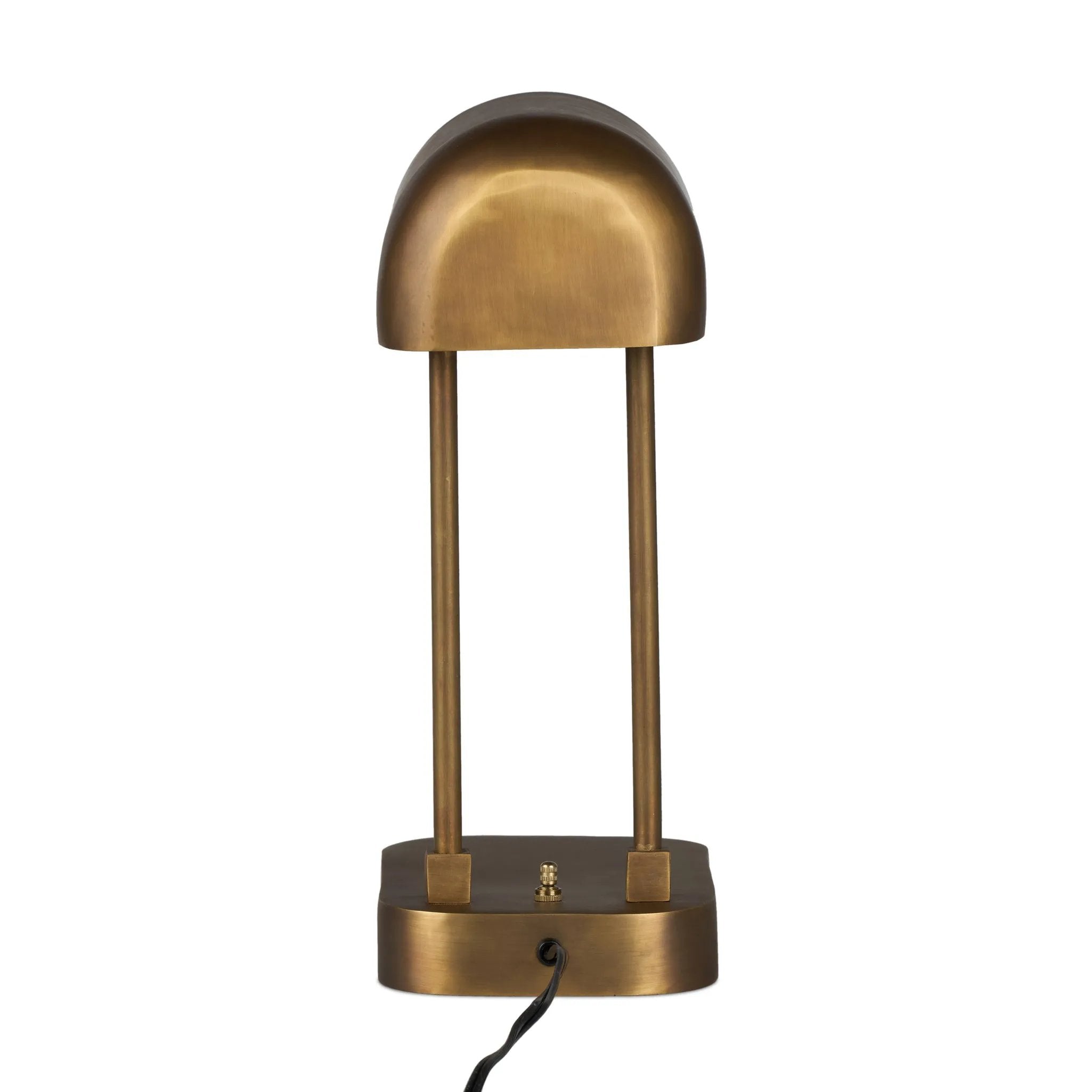 A library task light brings focused illumination to your workspace, nightstand or end table. Crafted from brass with an aged antique finish, the lamp has a rotary switch on the base and double post arms to hold the metal shade in place Amethyst Home provides interior design, new home construction design consulting, vintage area rugs, and lighting in the Des Moines metro area.