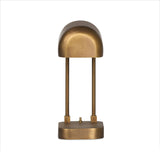 A library task light brings focused illumination to your workspace, nightstand or end table. Crafted from brass with an aged antique finish, the lamp has a rotary switch on the base and double post arms to hold the metal shade in place Amethyst Home provides interior design, new home construction design consulting, vintage area rugs, and lighting in the Scottsdale metro area.