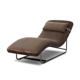 Contoured for comfort, this minimalist chaise is fixed with ideal ergonomics so you can simply sit back and unwind. Inspired by 1960s European design, the chaise blends a utilitarian aesthetic with high-quality tufting, stainless-steel framing, and smooth upholstery. The adjustable headrest is secured by a metal closure and magnetic strip. Amethyst Home provides interior design, new home construction design consulting, vintage area rugs, and lighting in the Alpharetta metro area.