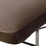 Contoured for comfort, this minimalist chaise is fixed with ideal ergonomics so you can simply sit back and unwind. Inspired by 1960s European design, the chaise blends a utilitarian aesthetic with high-quality tufting, stainless-steel framing, and smooth upholstery. The adjustable headrest is secured by a metal closure and magnetic strip. Amethyst Home provides interior design, new home construction design consulting, vintage area rugs, and lighting in the Los Angeles metro area.