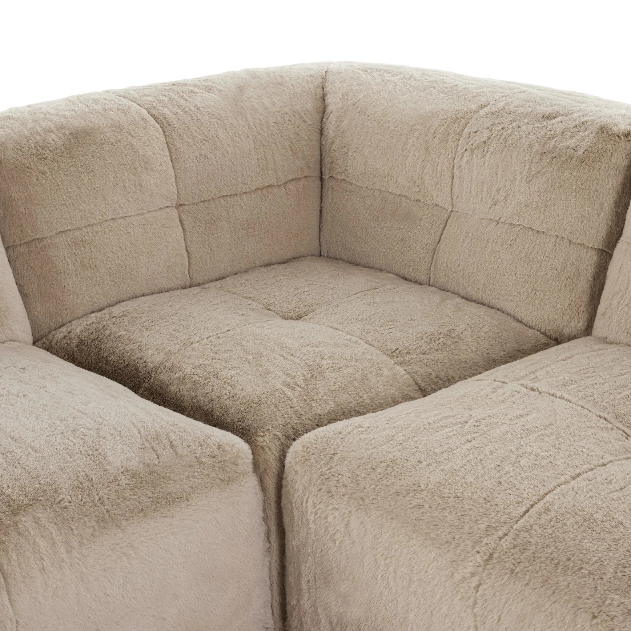 Modularity at its best — and comfiest. Five piece sectional covered in a plush fabric that's luxuriously soft to the touch Amethyst Home provides interior design, new home construction design consulting, vintage area rugs, and lighting in the Austin metro area.