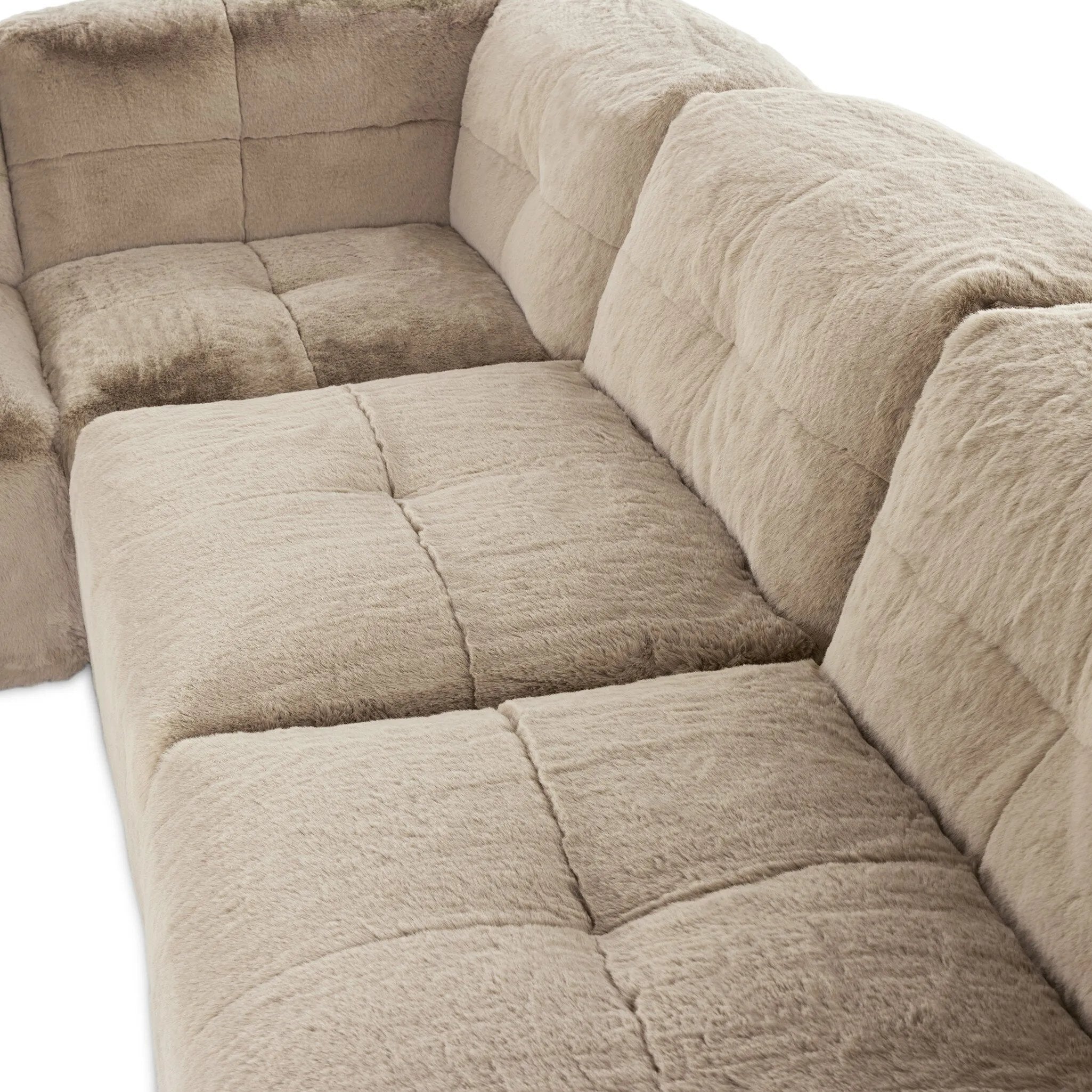 Modularity at its best — and comfiest. Five piece sectional covered in a plush fabric that's luxuriously soft to the touch Amethyst Home provides interior design, new home construction design consulting, vintage area rugs, and lighting in the Des Moines metro area.