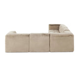 Modularity at its best — and comfiest. Six piece sectional covered in a plush fabric that's luxuriously soft to the touch Amethyst Home provides interior design, new home construction design consulting, vintage area rugs, and lighting in the Newport Beach metro area.