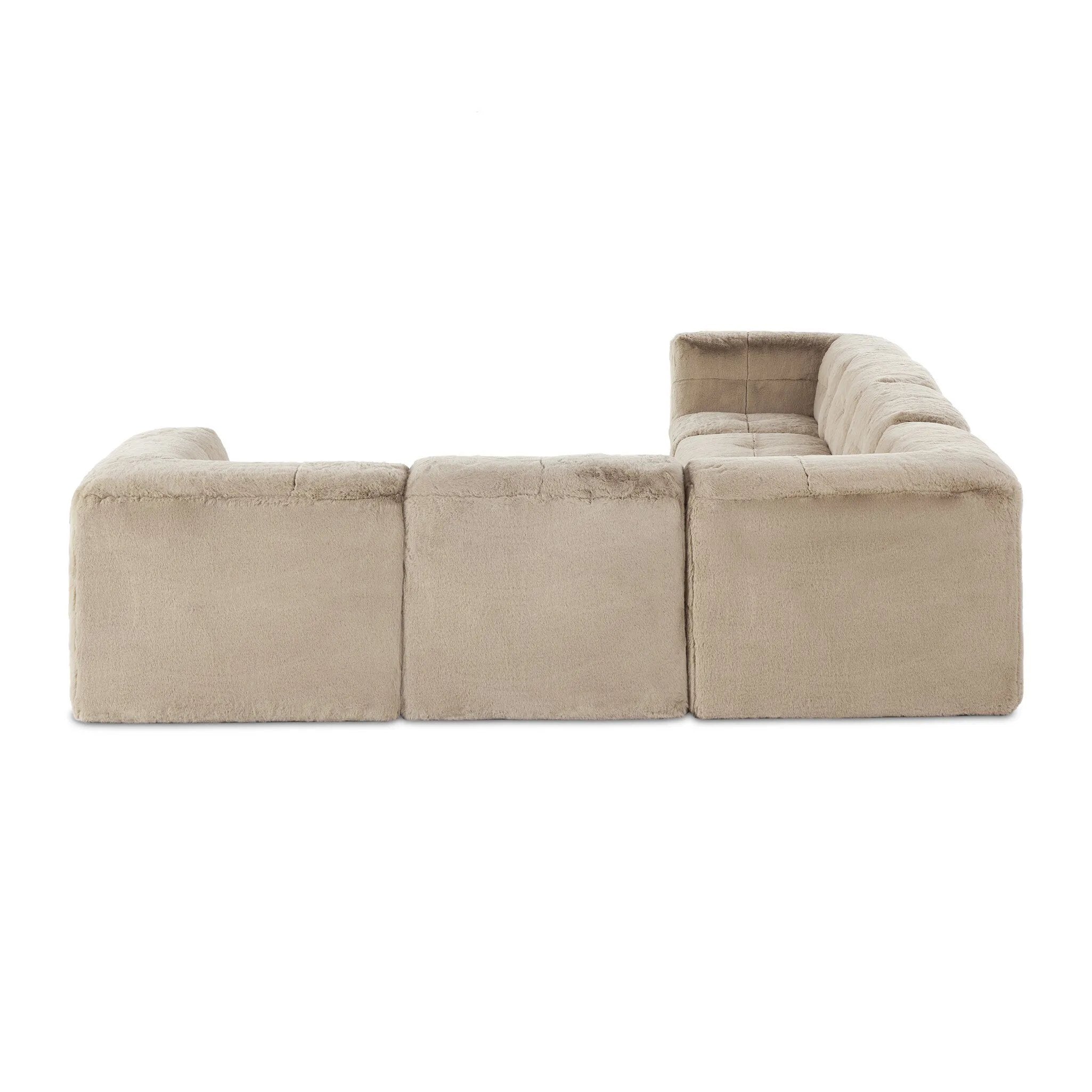 Modularity at its best — and comfiest. Six piece sectional covered in a plush fabric that's luxuriously soft to the touch Amethyst Home provides interior design, new home construction design consulting, vintage area rugs, and lighting in the Newport Beach metro area.