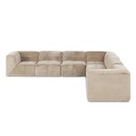 Modularity at its best, and softest. This versatile sectional includes seven pieces crafted with soft cushioning and S-spring suspension for a supportive sit. All covered in a plush, furry fabric that feels luxurious to sink into. Discreet seams add a touch of structure throughout Amethyst Home provides interior design, new home construction design consulting, vintage area rugs, and lighting in the Dallas metro area.