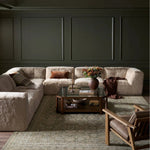 Modularity at its best, and softest. This versatile sectional includes seven pieces crafted with soft cushioning and S-spring suspension for a supportive sit. All covered in a plush, furry fabric that feels luxurious to sink into. Discreet seams add a touch of structure throughout Amethyst Home provides interior design, new home construction design consulting, vintage area rugs, and lighting in the Park City metro area.