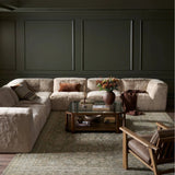 Modularity at its best, and softest. This versatile sectional includes seven pieces crafted with soft cushioning and S-spring suspension for a supportive sit. All covered in a plush, furry fabric that feels luxurious to sink into. Discreet seams add a touch of structure throughout Amethyst Home provides interior design, new home construction design consulting, vintage area rugs, and lighting in the Park City metro area.