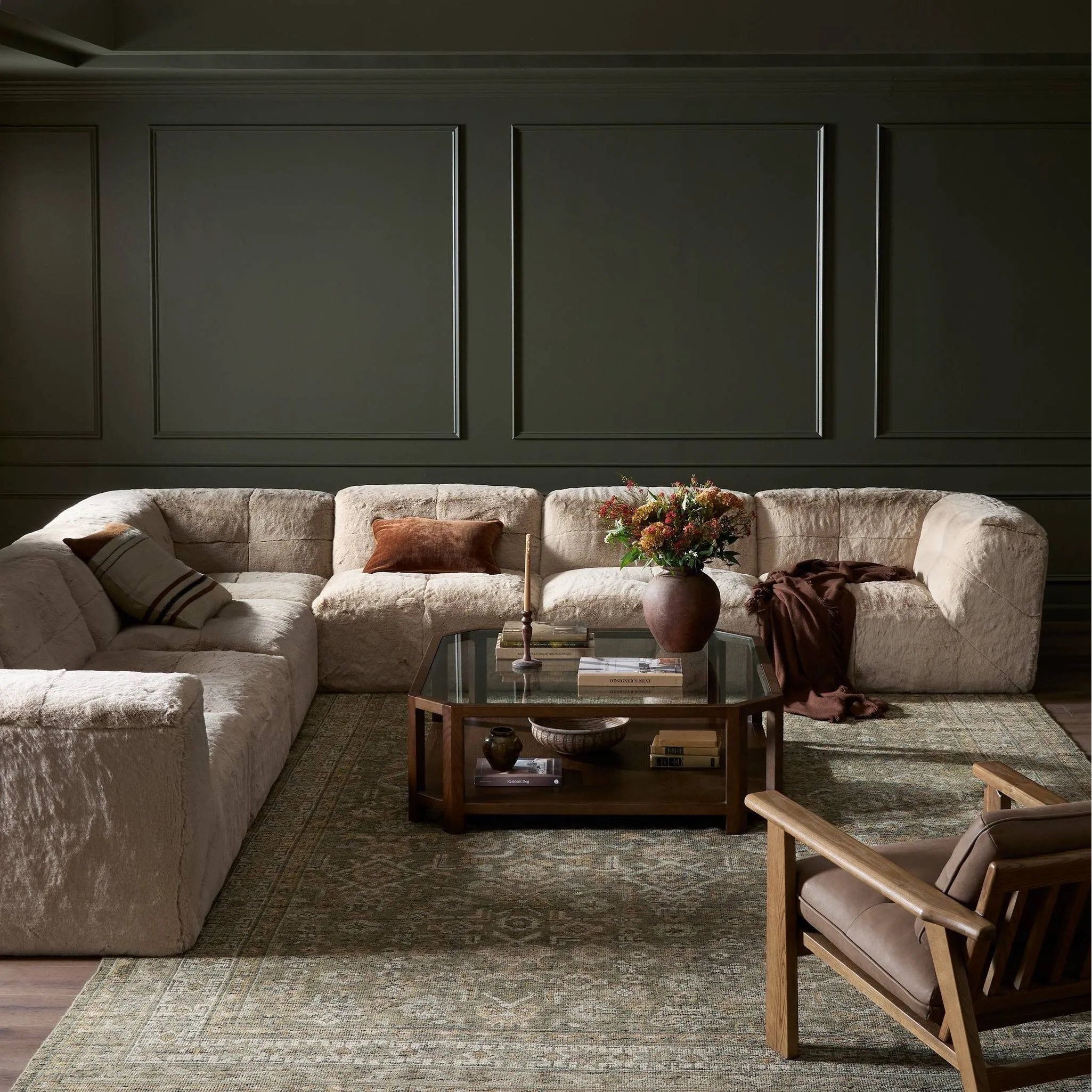 Modularity at its best, and softest. This versatile sectional includes seven pieces crafted with soft cushioning and S-spring suspension for a supportive sit. All covered in a plush, furry fabric that feels luxurious to sink into. Discreet seams add a touch of structure throughout Amethyst Home provides interior design, new home construction design consulting, vintage area rugs, and lighting in the Park City metro area.